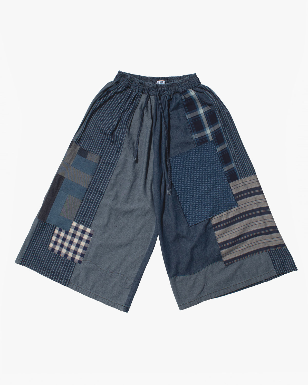 Washed indigo wide leg pants with patchwork by Kiriko Made