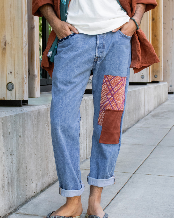Custom patched denim jeans by Kiriko Made