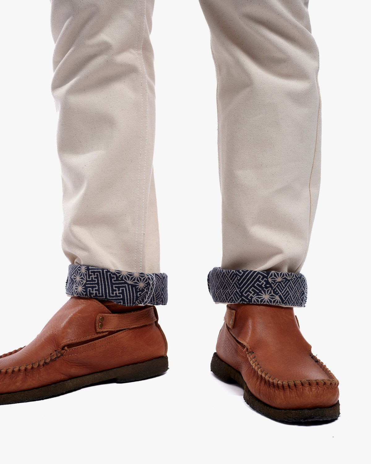 Cream canvas pants with small multi pattern by Kiriko Made